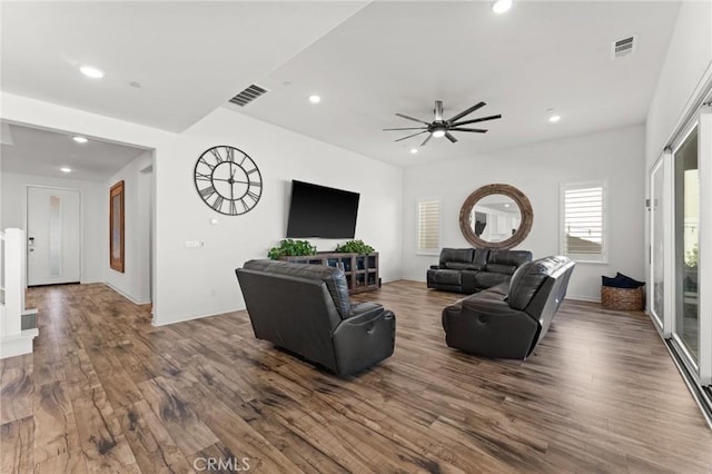 living room with hardwood / wood-style floors and ceiling fan