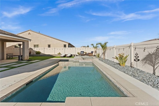 view of pool featuring a patio area