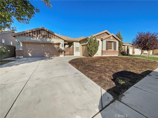 single story home with a garage