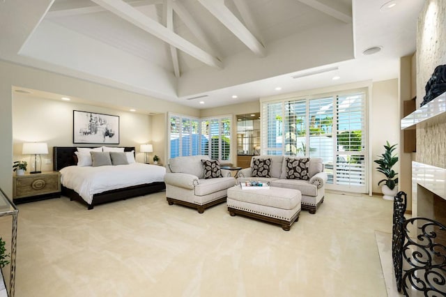 bedroom with carpet flooring and lofted ceiling with beams