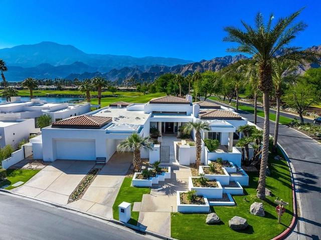 view of front of home featuring a mountain view