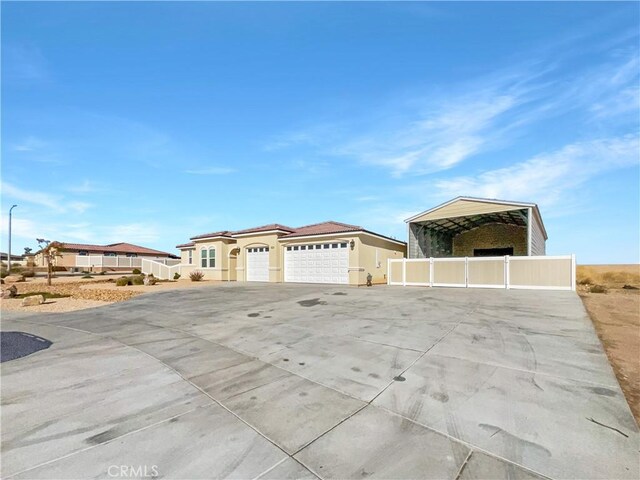 view of front facade with a carport