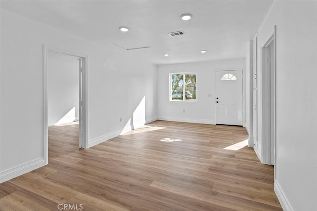 entryway with light hardwood / wood-style flooring