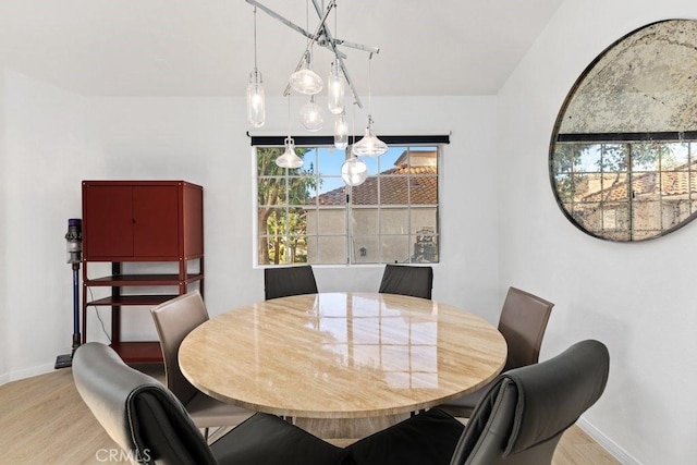 dining room featuring light hardwood / wood-style flooring