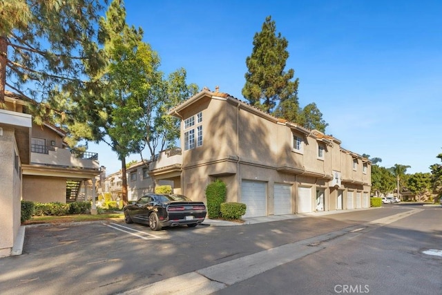 view of building exterior with a garage