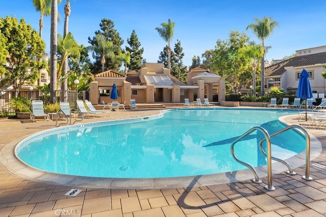 view of pool with a patio area