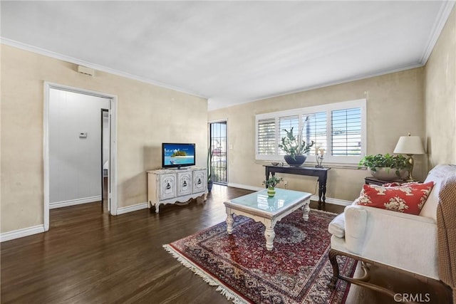 living room featuring dark hardwood / wood-style floors and ornamental molding