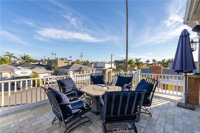 view of patio with an outdoor fire pit