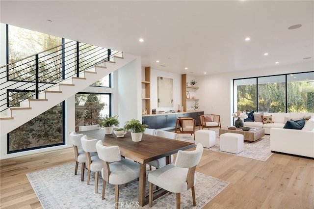 dining space with light wood-type flooring