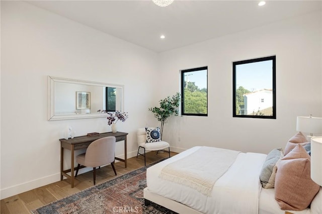 bedroom featuring hardwood / wood-style floors