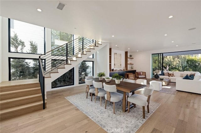 dining space featuring light hardwood / wood-style floors