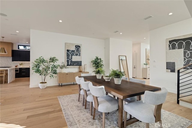 dining room featuring light wood-type flooring