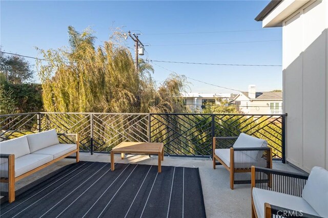 balcony featuring outdoor lounge area