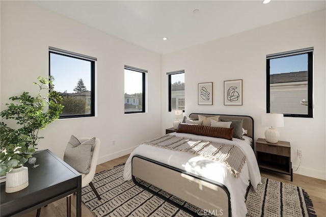 bedroom featuring light hardwood / wood-style flooring