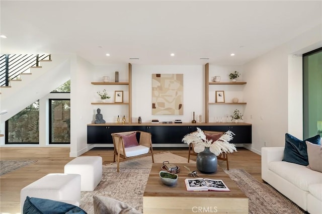 living room with light hardwood / wood-style flooring