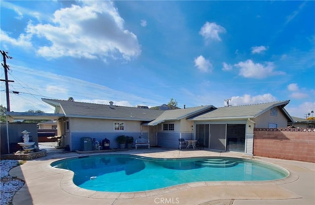 view of pool with a patio area