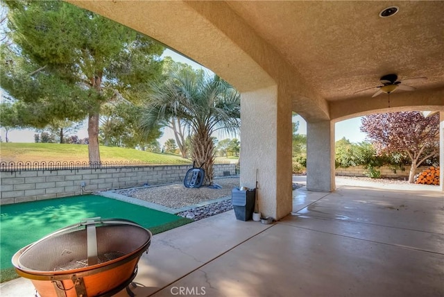 view of patio / terrace with ceiling fan