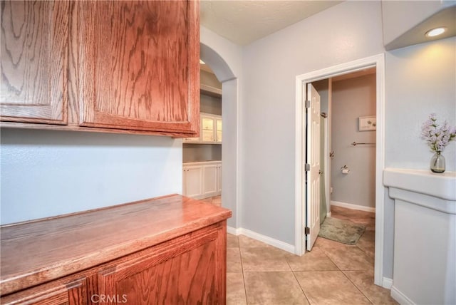 interior space featuring light tile patterned flooring