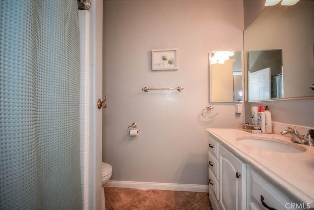 bathroom with tile patterned flooring, vanity, a shower with shower curtain, and toilet