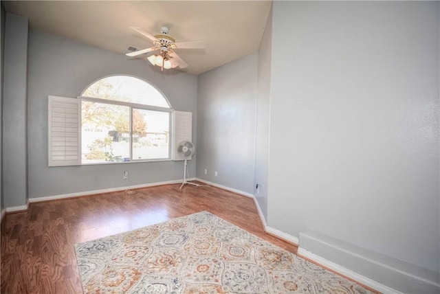 spare room featuring ceiling fan and hardwood / wood-style floors