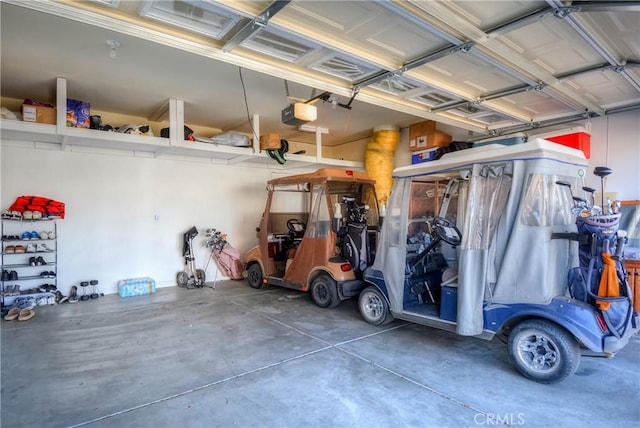 garage featuring a garage door opener