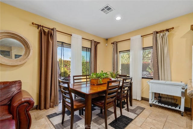 dining space featuring a healthy amount of sunlight