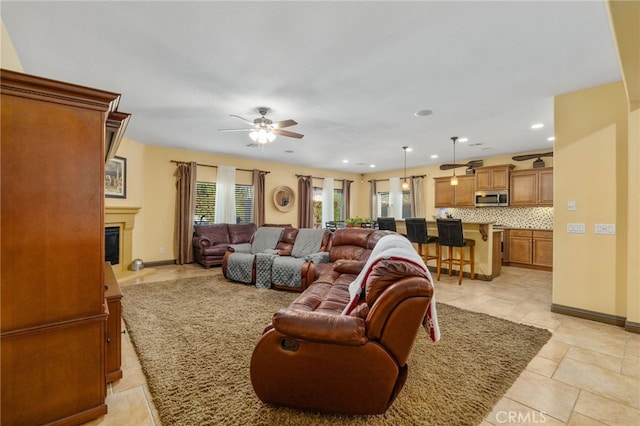 living room with ceiling fan