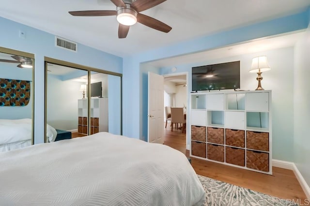 bedroom featuring ceiling fan and hardwood / wood-style flooring