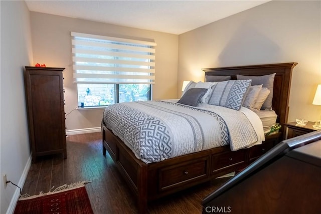 bedroom featuring dark hardwood / wood-style floors