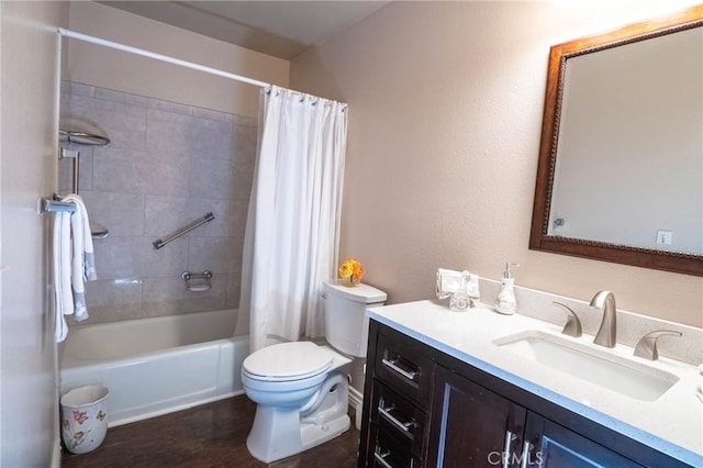 full bathroom featuring hardwood / wood-style floors, vanity, toilet, and shower / bath combo with shower curtain