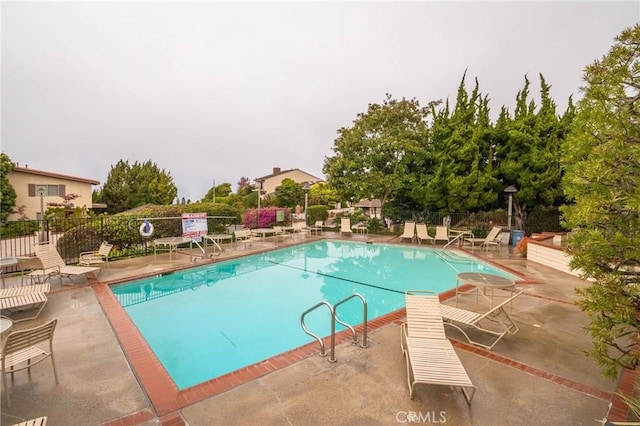 view of pool with a patio area