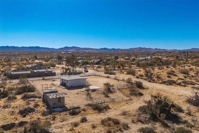 drone / aerial view featuring a mountain view