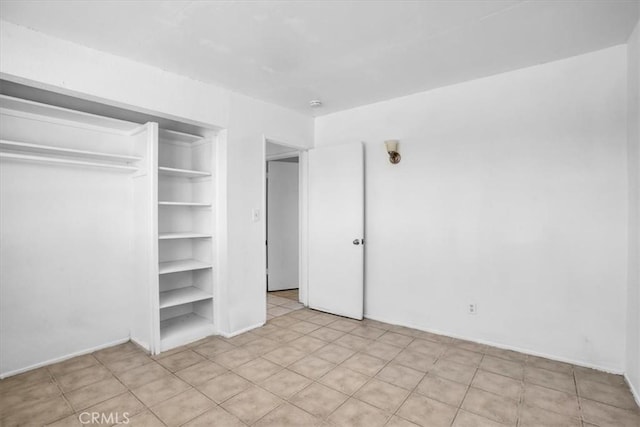 unfurnished bedroom with a closet