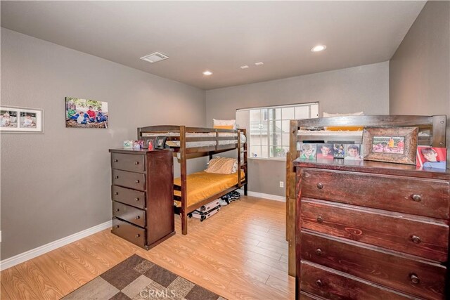 bedroom featuring light wood-type flooring