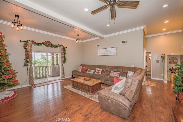 living room with ornamental molding and hardwood / wood-style flooring