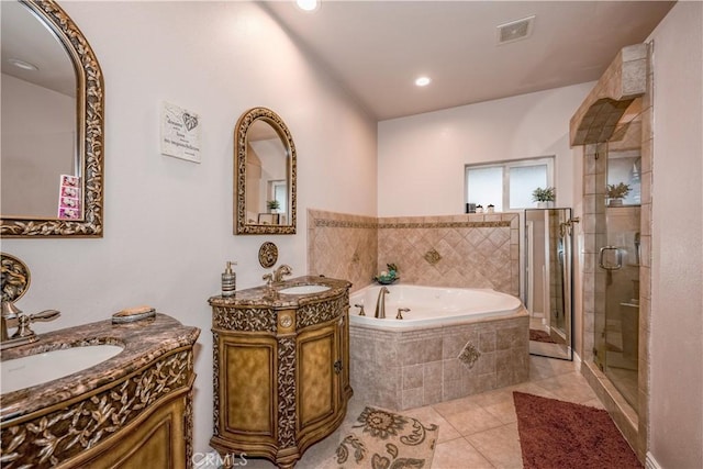 bathroom with vanity, tile patterned floors, and independent shower and bath