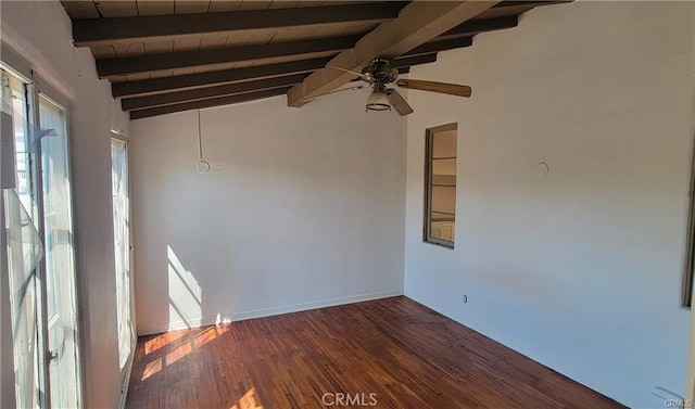 spare room featuring dark hardwood / wood-style floors, ceiling fan, and lofted ceiling with beams