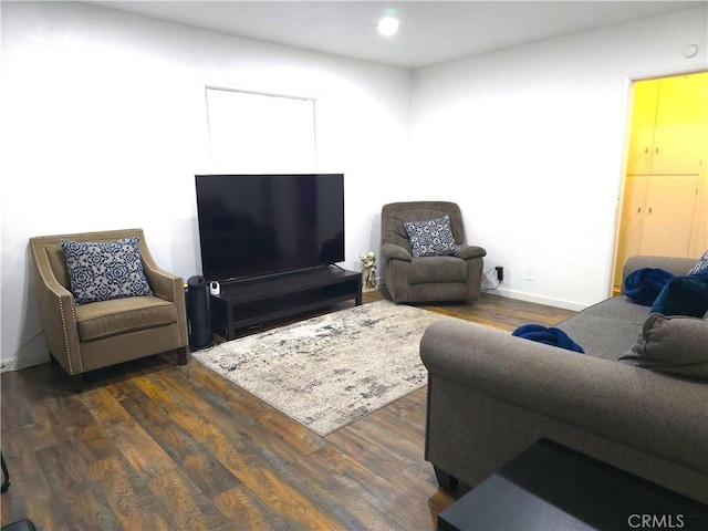 living room featuring dark hardwood / wood-style flooring