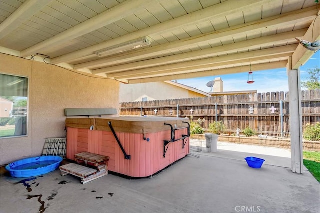 view of patio with a hot tub