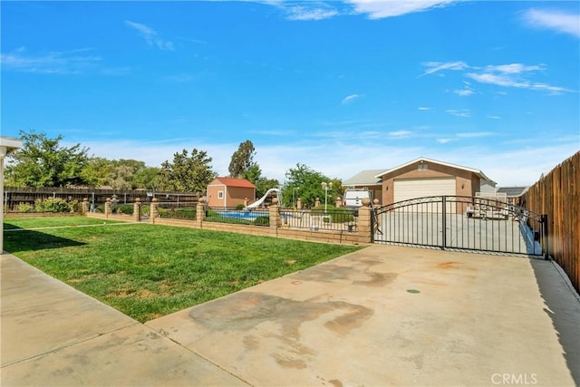 view of yard featuring a garage