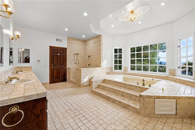 bathroom with vanity, tile patterned floors, and independent shower and bath