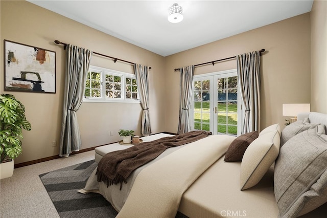 bedroom with carpet flooring and french doors