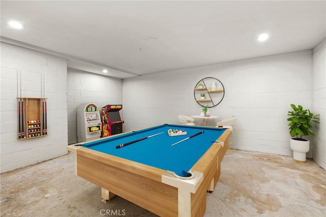 rec room with concrete floors and billiards