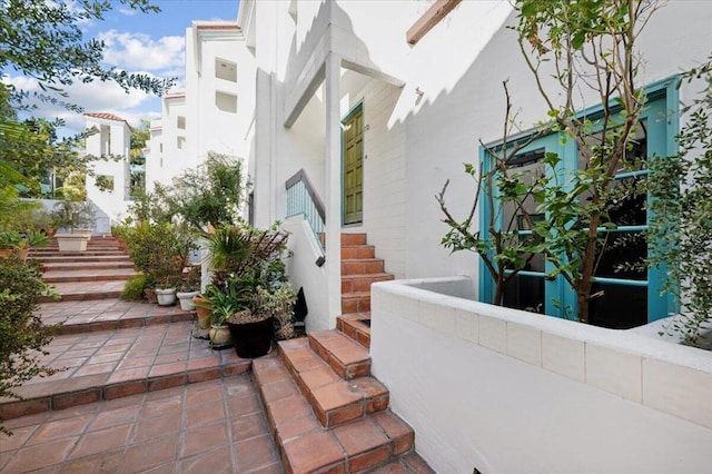 entrance to property featuring a patio