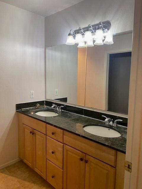 bathroom featuring vanity and tile patterned floors