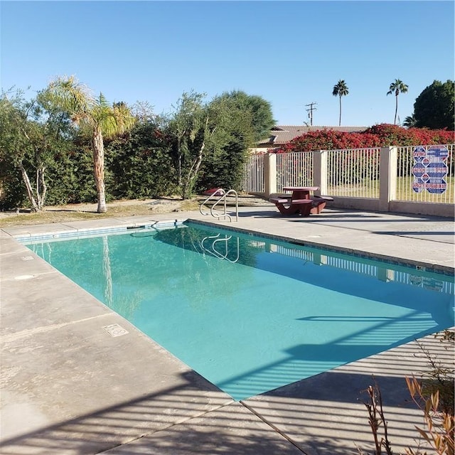 view of pool with a patio area