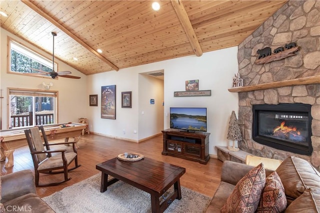 living area with high vaulted ceiling, a fireplace, wood finished floors, wood ceiling, and baseboards