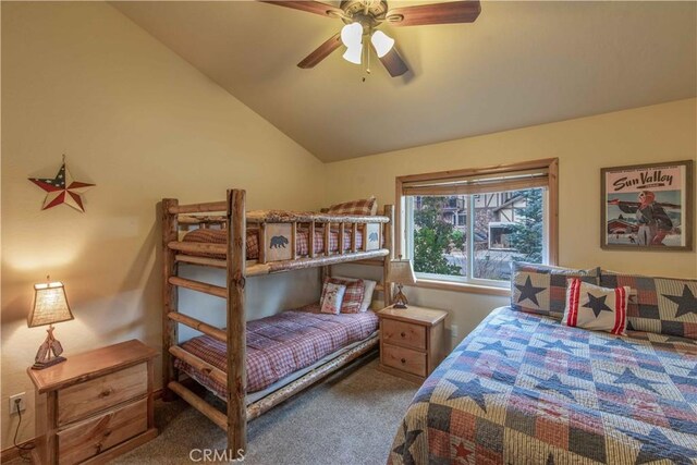 bedroom featuring ceiling fan, carpet, and vaulted ceiling