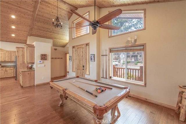 playroom with plenty of natural light, high vaulted ceiling, wooden ceiling, and light hardwood / wood-style floors