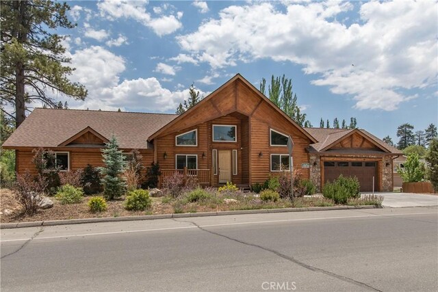 log home with a garage